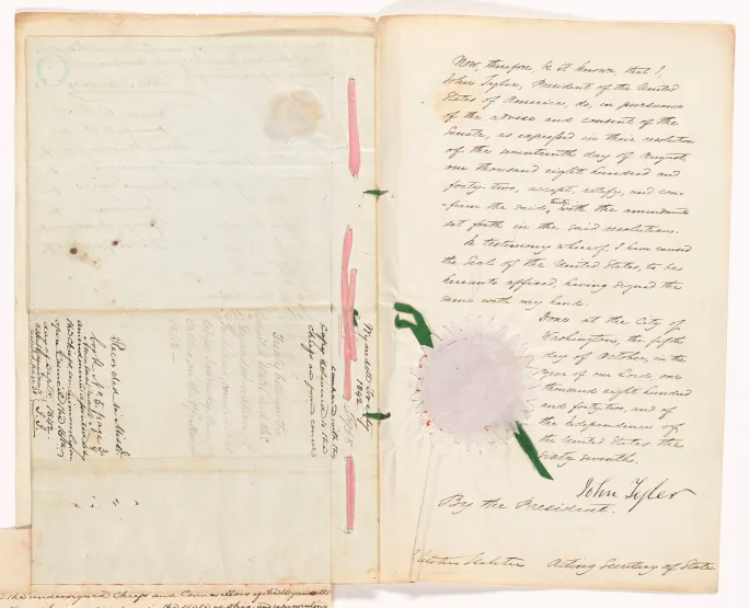 معاهده 1842 با Wyandots که روی کاغذو روبان صورتی برای بهم بستن برگه ها و ربان سبز برای مهروموم معاهده به کار رفته است